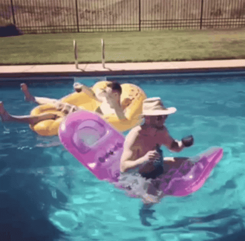 Two Men Floating on Rafts