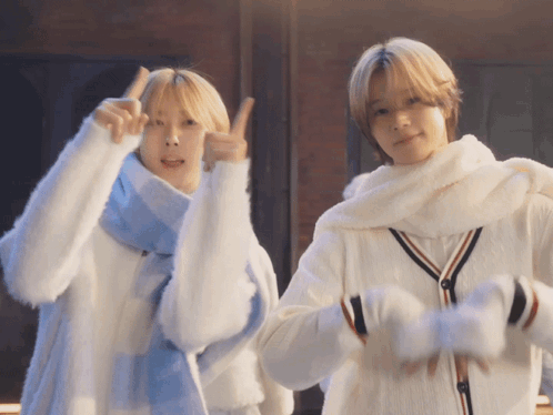 Two Men Giving Thumbs Up
