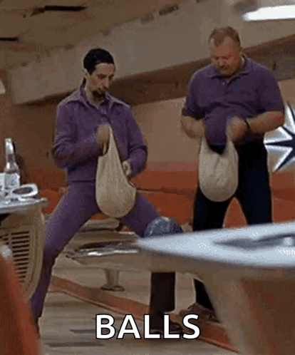 Two Men Holding Bags In Bowling Alley GIF
