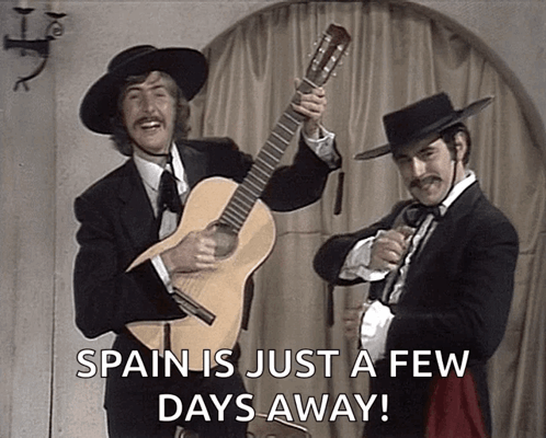 Two Men Holding Guitars Spain Just Days Away GIF