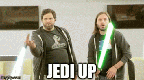 Two Men Holding Lightsabers