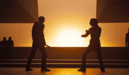 Two Men Holding Swords
