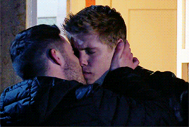 Two Men Hugging And Kissing GIF