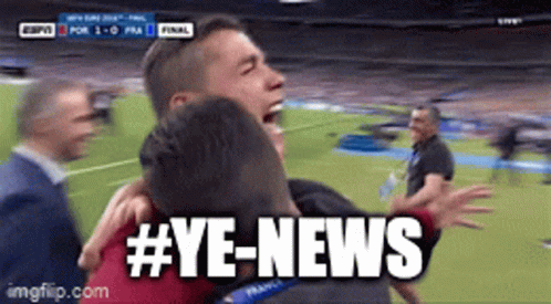 Two Men Hugging on Soccer Field #ye-news