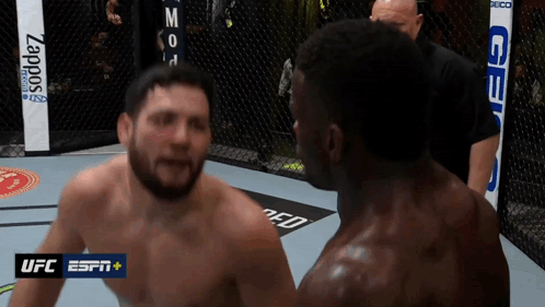 Two Men In A Boxing Ring With The Ufc Espn Logo Visible GIF