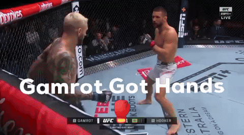 Two Men In A Boxing Ring With The Words Gamrot Got Hands On The Bottom GIF