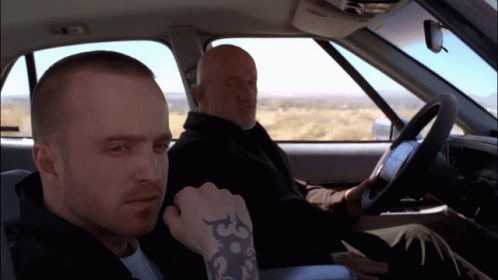 Two Men In A Car One With A Tattoo On His Wrist GIF