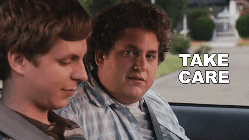 Two Men In A Car With The Words Take Care Written On The Screen GIF