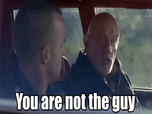 two men in a car with the words you are not the guy