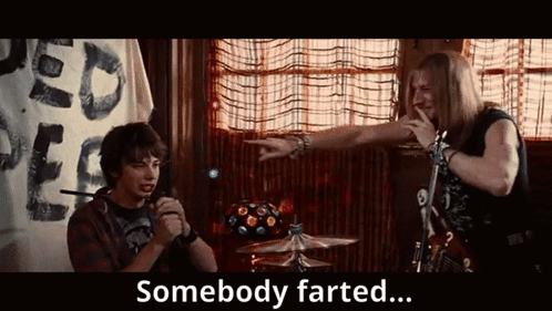 Two Men In A Room With The Words Somebody Farted Behind Them GIF
