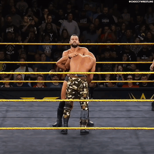 Two Men In A Wrestling Ring With The Words Choccy Wrestling On The Bottom Right GIF