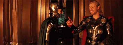 Two Men In Armor Are Standing Next To Each Other And One Is Pointing GIF