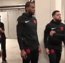 Two Men In Black Nike Jackets GIF