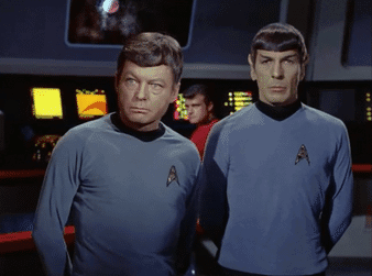 Two Men in Blue Shirts
