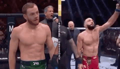 Two Men In Boxing Ring Celebrating GIF