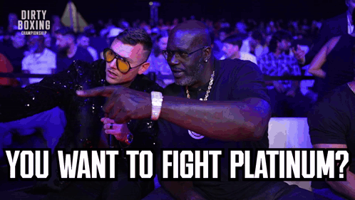 Two Men in Boxing Ring Pointing