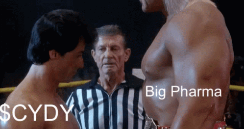 Two Men in Boxing Ring Saying Big Pharma
