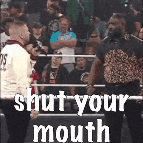 Two Men in Boxing Ring Saying Shut Your Mouth