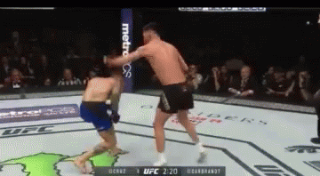 Two Men In Boxing Ring With Metropcs Banner GIF
