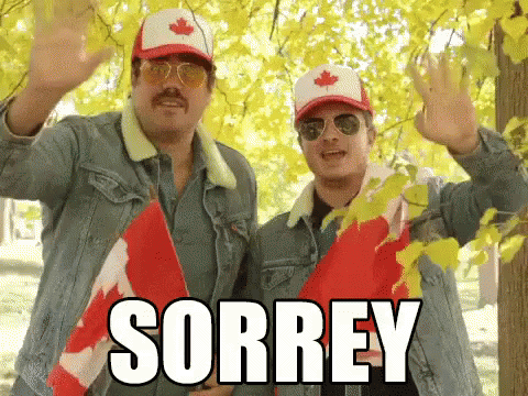 Two Men in Canadian Hats and Sunglasses Waving Sorrey