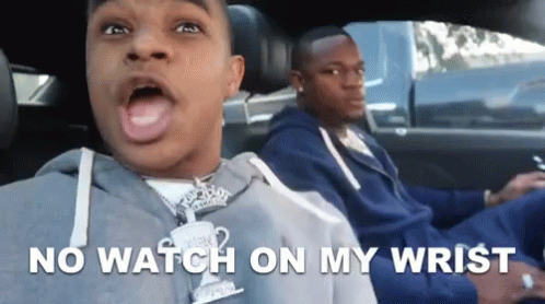 Two Men in Car No Watch on Wrist