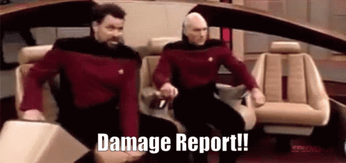 Two Men in Car With Damage Report