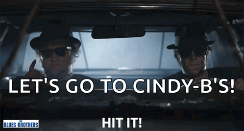 Two Men in Car With Let's Go to Cindy-B's