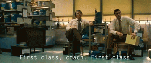 Two Men In Chairs Saying First Class Coach GIF