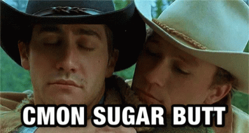 Two Men In Cowboy Hats Are Hugging Each Other With The Words Cmon Sugar Butt Written Below Them GIF