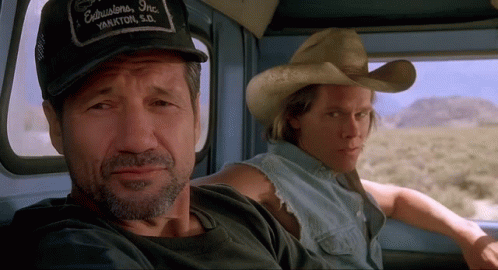 Two Men In Cowboy Hats Sitting In Truck GIF
