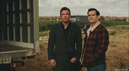 Two Men in Field With fzmovies.net