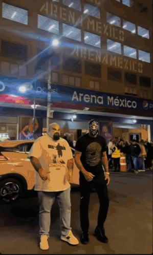 Two Men in Front of Arena Mexico