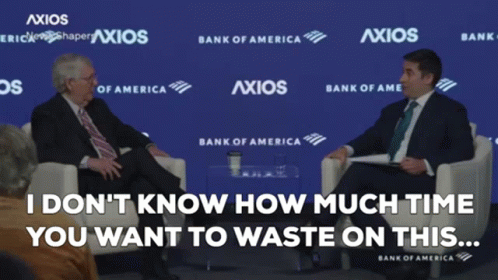 Two Men in Front of Bank of America Sign