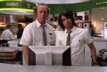 Two Men in Front of Campsters Monitor