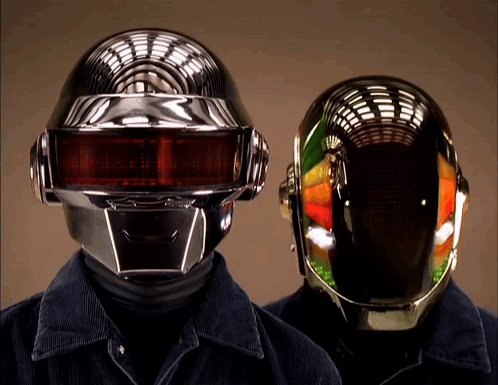 Two Men in Futuristic Helmets