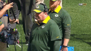Two Men in Green Bay Packers Shirts