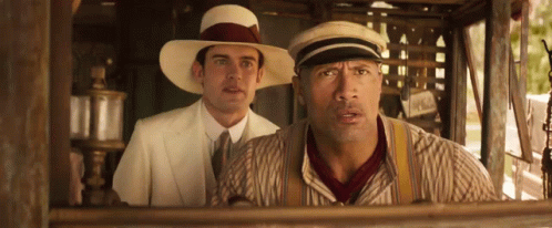 Two Men in Hats and Suspenders