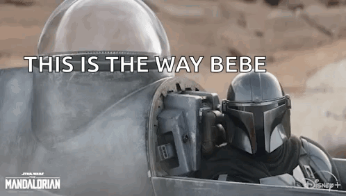 Two Men In Helmets In Star Wars GIF