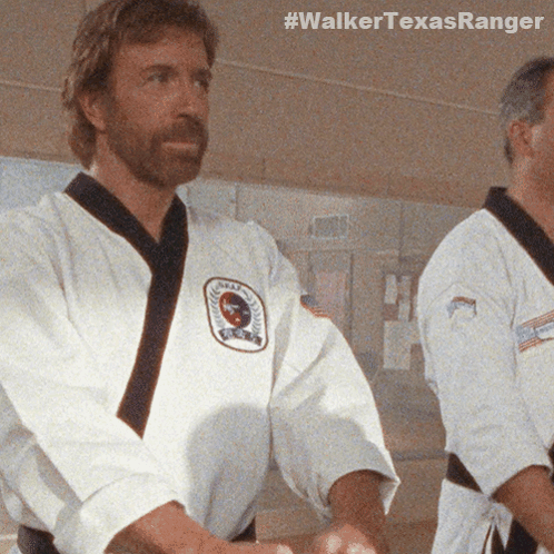Two Men In Karate Uniforms Are Standing Next To Each Other With #Walkertexasranger Written On The Bottom Right GIF