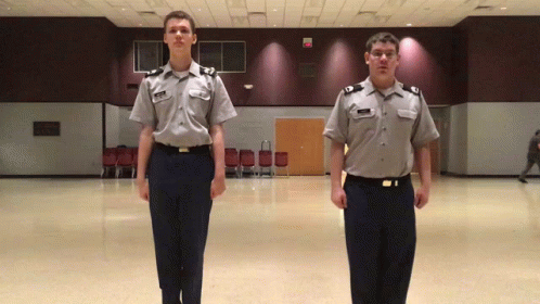 Two Men in Military Uniforms Standing