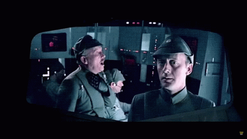 Two Men in Military Uniforms Yawning