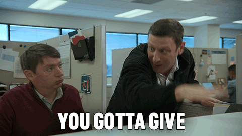 Two Men in Office Cubicle Saying You Gotta Give