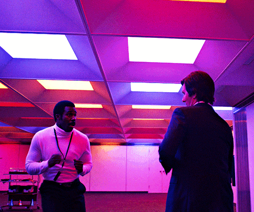 Two Men In Purple Lights GIF