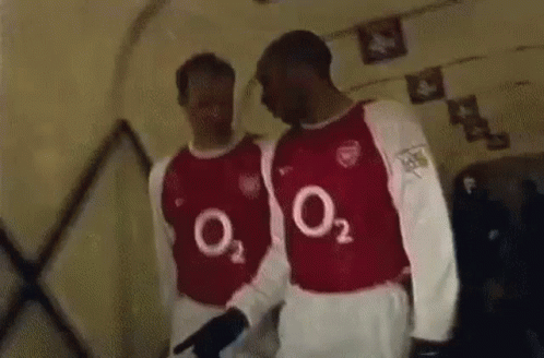 Two Men in Red and White Jerseys with O2