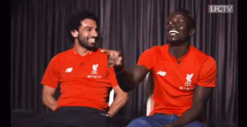 Two Men In Red LFC Shirts Laughing GIF