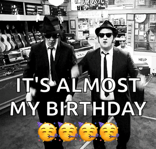Two Men In Suits And Hats Are Dancing In A Store With The Words It 'S Almost My Birthday GIF