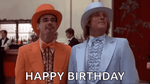 two men in suits and hats are standing next to each other with the words `` happy birthday '' written below them .