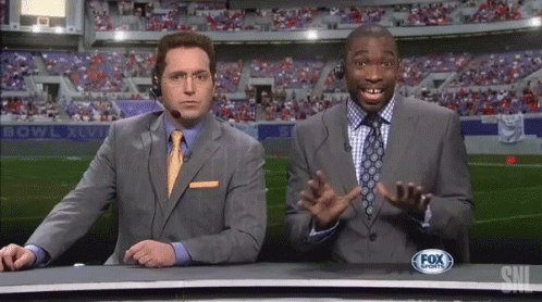 Two Men In Suits And Ties Are On Fox Sports GIF