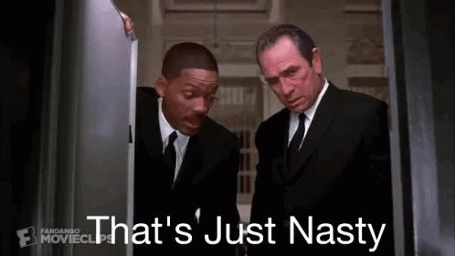Two Men In Suits And Ties Are Standing Next To Each Other In A Room . GIF