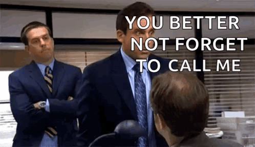 Two Men in Suits and Ties Talking